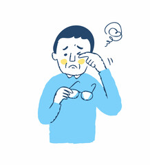 目の調子か悪い男性