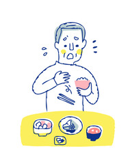 食事中に箸を落とすシニア男性