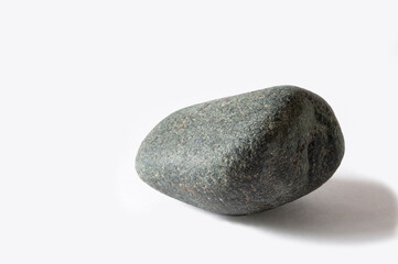Dark gray stone on a white background.