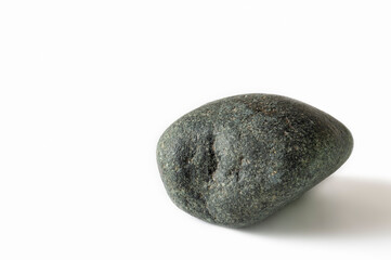 Dark gray stone on a white background.