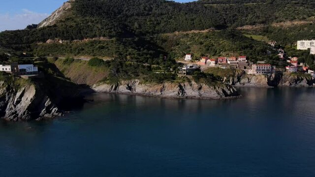 Aerial fly over of the the final stretch of Mediterranean coastline in France - C&ocirc;te Vermeille in the south of France just before the boarder with Spain
