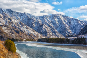 Winter landscape. River in Altai on a sunny day. Russia