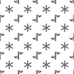 Vector seamless pattern with bamboo and shuriken. Gray background with japanese weapon