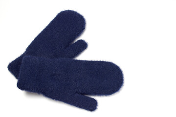 Blue woolen mittens isolated on white background. Winter clothes. Flat lay, top view.