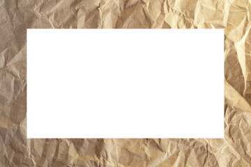 Frame of crumpled kraft paper with a white middle.