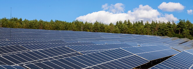 Solar panels in Large Photovoltaic power station, solar park, Renewable energy Sustainable energy,...
