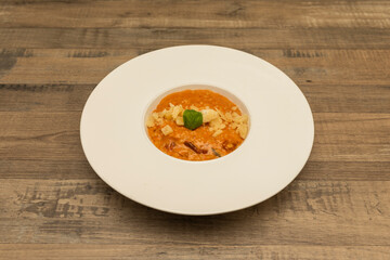 Traditional Italian risotto is prepared by gradually adding a broth to the rice, along with other ingredients according to specific recipes. It is one of the most common ways to cook rice in Italy.