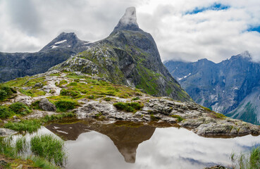 Mt Romsdalshorn reflected in a lagoon from Litlefjellet, norway