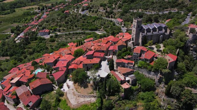 Aerial fly over above the village is Eus in French Catalonia - One of the Plus Beaux Villages de France