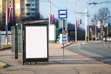 blank billboard with copy space ready for design at bus stop, outdoor advertising concept, mock up