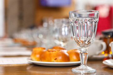Empty wine glasses are on the table in the restaurant.