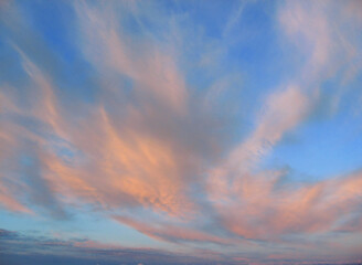Beautiful evening sky with pink clouds at sunset