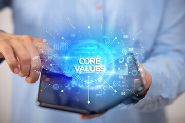 Businessman holding a foldable smartphone, new business concept