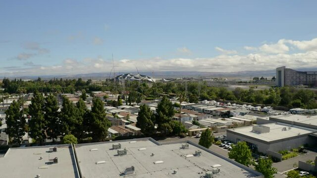 Googleplex And Ames Research Center In Sunlight Against Cloudy Sky - Mountain View, California