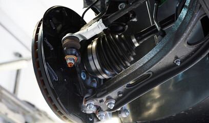 Obraz premium The structure and elements of suspension of a modern car. Selected focus.