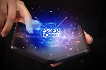 Businessman holding a foldable smartphone, new business concept