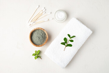Organic cosmetics for skin care.Cosmetic clay, cotton swabs, face cream, towel. Top view.