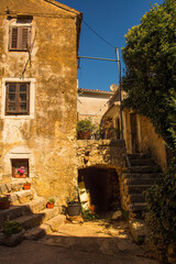 An historic stone house in the medieval hill village of Dobrinj on Krk island in the Primorje-Gorski Kotar County of western Croatia
