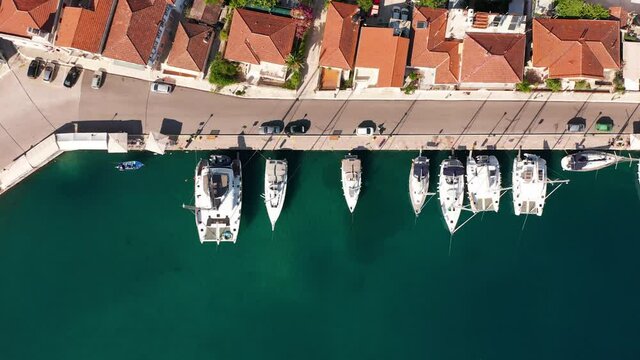 Drone view of moored luxury sailing boats at Vathi port in Ithaca Greece