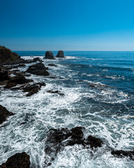 Vertical view of Punta de Lobos with its natural rocks in the background.