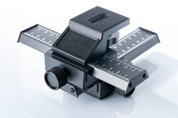 Aluminum 4-way macro photography focus slider isolated on white