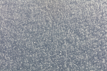 fresh white snow and ice crystal background