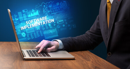 Businessman working on laptop concept