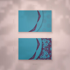 Business card in turquoise color with abstract purple ornament for your brand.