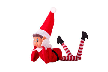 Christmas Elf toy on an isolated white background with copy space. Christmas spirit, Christmas tradition. - obrazy, fototapety, plakaty