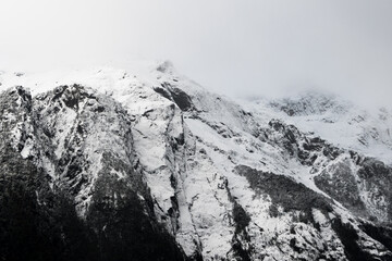 Panoramic view of the snow-capped mountains in hornopiren national park on a winter day.