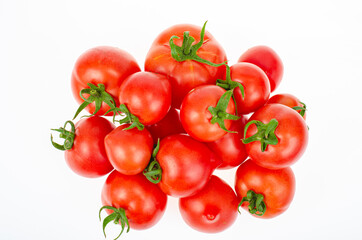 Bunch of ripe fresh pink farm tomatoes with isolated on white background. Studio Photo.