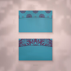Business card template in turquoise color with abstract purple ornament for your contacts.