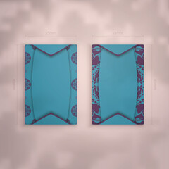 Business card template in turquoise color with Indian purple ornaments for your brand.