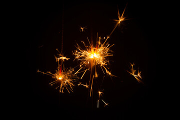 burning sparkler on a black background