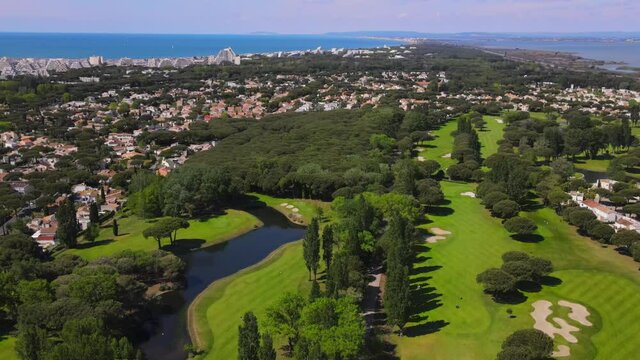 Aerial flyover of golf course in the South of France