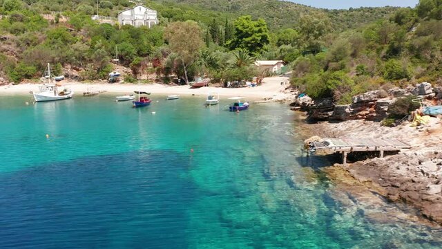 Drone view of fishing boats at Sarakiniko port in Ithaca Greece