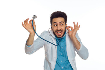 Fototapeta premium male doctor otoscope hospital treatment therapist light background