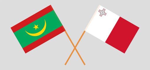 Crossed flags of Mauritania and Malta. Official colors. Correct proportion