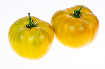 Fresh yellow tomatoes isolated on white background. Studio Photo.