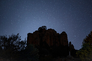 stars light over rock mountain  - 467451087