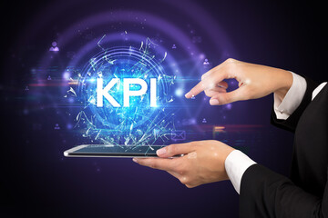 Close-up of a touchscreen with abbreviation.