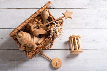 wooden toys, eco-friendly toys, toys for children made of wood, a set of toys made of wood on a light background