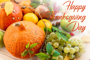 Happy Thanksgiving day card - traditional holiday food with pumpkins on old wooden	
