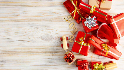 Christmas gifts boxes red and gold colors ]background - top view	
