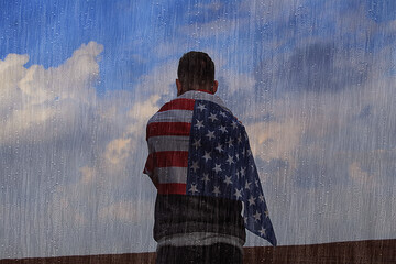 Rain, USA. An American boy with the USA flag stands in the pouring rain. The rain is pouring down...