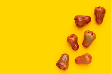 Rose apple on yellow background