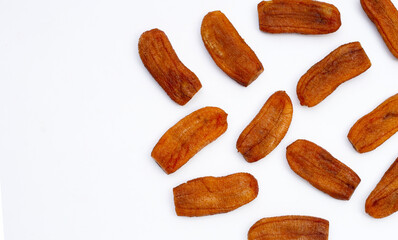 Sun dried bananas on white background.