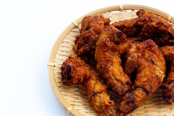 Fried chicken necks on white background.