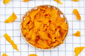 Sweet potato chips on white background.
