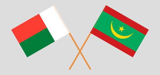 Crossed flags of Madagascar and Mauritania. Official colors. Correct proportion